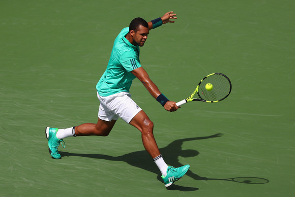 Jo-Wilfried Tsonga plays a backhand during his win on Tuesday. Photo: Julian Finney/Getty Images