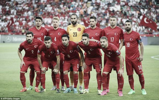 Turkey pose before a game. (Getty)