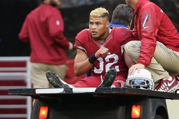 Tyrann Mathieu being carted off the field during a game against the St. Louis Rams | Christian Petersen - Getty Images