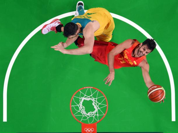 Andrew Bogut gets his fifth and final foul on a Ricky Rubio drive, a play that definitely hindered Australia and probably led to the loss in the end. Photo Credit: USA TODAY Sports. 