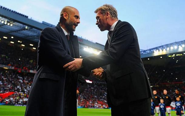 Guardiola greets Moyes last time he was at Old Trafford. Image via telegraph.co.uk