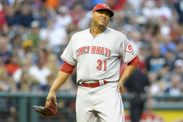 Starting pitcher Alfredo Simon #31 of the Cincinnati Reds reacts after giving up a three-run home run during the fourth inning against the Cleveland Indians at Progressive Field on August 4, 2014 in Cleveland, Ohio. (Aug. 3, 2014 - Source: Jason Miller/Getty Images North America)