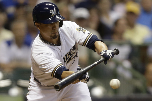 Kyle Lohse #26 of the Milwaukee Brewers lays down a bunt in the third inning against the Atlanta Braves at Miller Park on July 06, 2015 in Milwaukee, Wisconsin. (July 5, 2015 - Source: Mike McGinnis/Getty Images North America) 