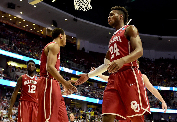 Buddy Hield #24 of the Oklahoma Sooners celebrates in the first half against the Oregon Ducks in the NCAA Men's Basketball Tournament West Regional Final at Honda Center on March 26, 2016 in Anaheim, California. (March 25, 2016 - Source: Harry How/Getty Images North America)