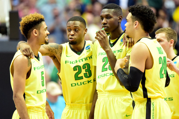 Tyler Dorsey #5, Elgin Cook #23, Chris Boucher #25, Casey Benson #2 and Dillon Brooks #24 of the Oregon Ducks huddle while taking on the Oklahoma Sooners in the NCAA Men's Basketball Tournament West Regional Final at Honda Center on March 26, 2016 in Anaheim, California. (March 25, 2016 - Source: Harry How/Getty Images North America)