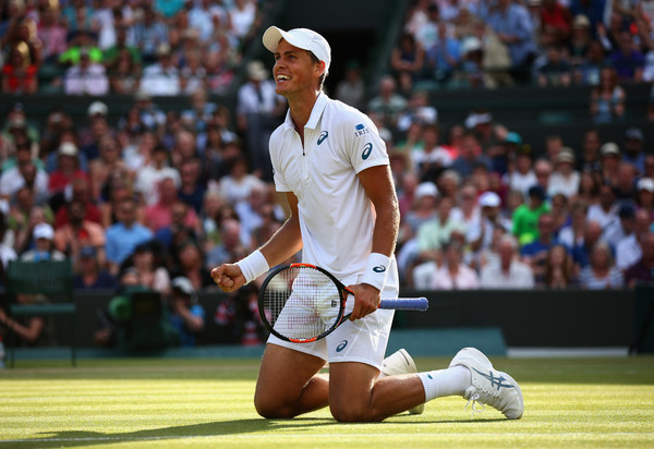 Vasek Pospisil of Canada celebrates after winning his Mens Singles Third Round match against James Ward of Great Britain on day six of the Wimbledon Lawn Tennis Championships. (Photo courtesy:  Ian Walton/Getty Images Europe)
