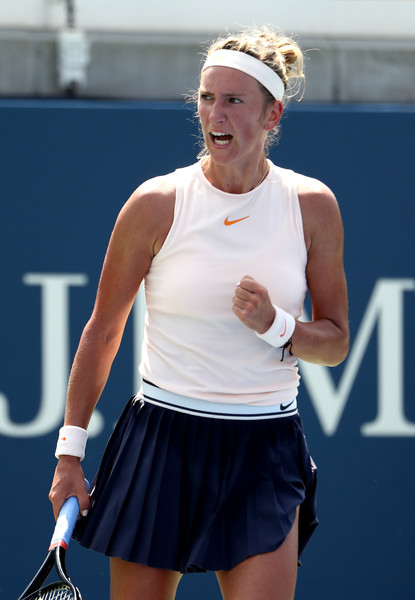 Victoria Azarenka celebrates winning the point | Photo: Al Bello/Getty Images North America