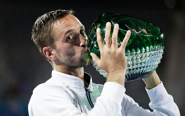 Viktor Troicki of Serbia celebrates and holds aloft the winners trophy after winning the men's final match against Grigor Dimitrov of Bulgaria during day seven of the 2016 Sydney International at Sydney Olympic Park Tennis Centre on January 16, 2016 in Sydney, Australia.