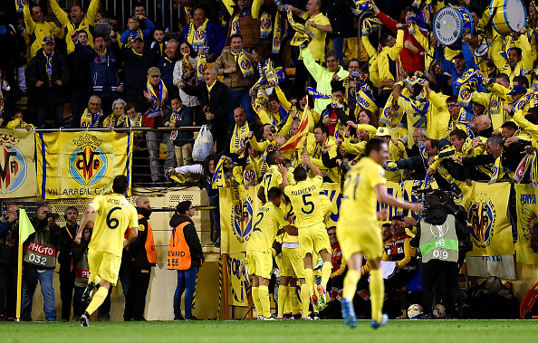 The Villarreal squad celebrates with the fans after Adrian Lopez's late winner. (Getty)