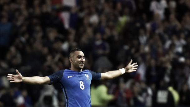 Above: Dimitri Payet celebrates his goal in France's 3-2 win over Cameroon 