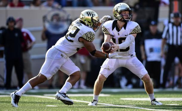 Wake Forest quarteback John Wolford (right) and running back Matt Colburn (left) in their game against Indiana | Source: Marc Lebryk - USA TODAY Sports