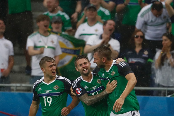 Jamie Ward celebrates Northern Ireland's opening goal. | Image credit: ODD ANDERSEN/AFP/Getty Images