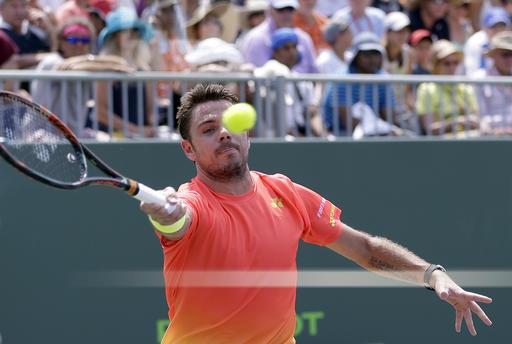 Stan Wawrinka returns the ball in the second round of the Miami Open (AP Photo/Alan Diaz)