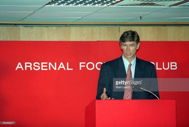 Wenger donning his infamous glasses in his early years at Arsenal | Photo: Getty