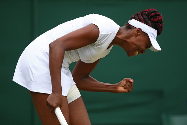 Venus Williams celebrates at Wimbledon. Photo: Clive Brunskill/Getty Images