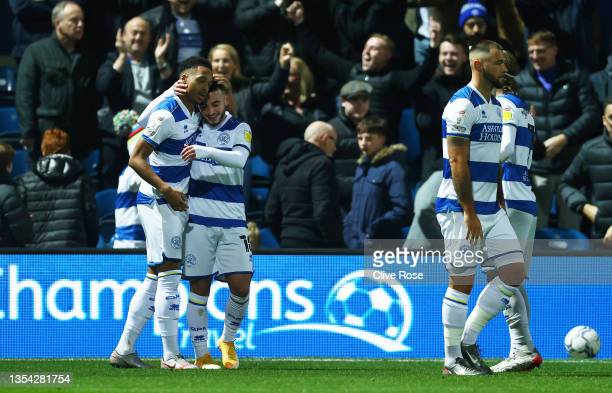 LONDON, ENGLAND - NOVEMBER 19: Chris Willock of Queens Park Rangers celebrates with Ilias Chair after scoring their team's first goal during the Sky Bet Championship match between Queens Park Rangers and Luton Town at The Kiyan Prince Foundation Stadium on November 19, 2021 in London, England. (Photo by Clive Rose/Getty Images)