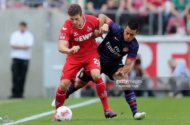 Wimmer plays in a pre-season friendly against Arsenal in 2012. Source | Getty Images.