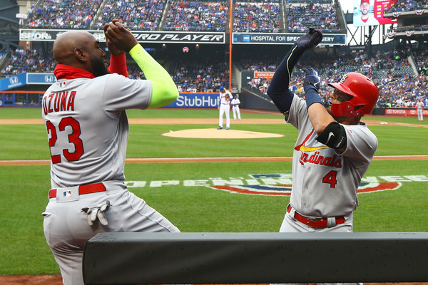 Yadier Molina (r.) celebrates with Marcell Ozuna (l.) after his two-run blast gave the Cardinals a 2-1 lead/Photo: Mike Stobe/Getty Images