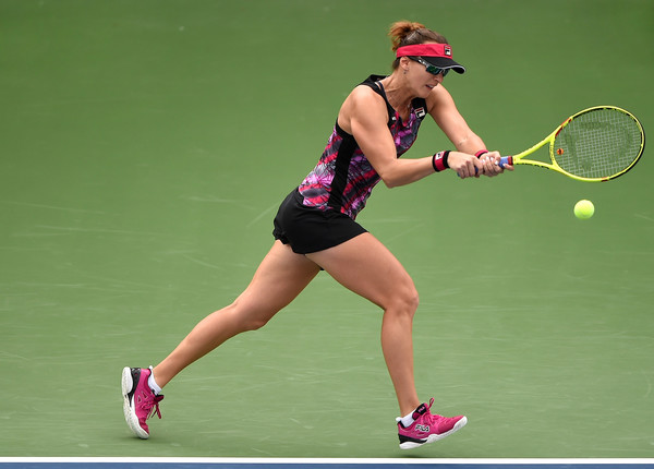 Yaroslava Shvedova hits a backhand during her first-round match against Monica Puig at the 2017 Dubai Duty-Free Tennis Championships. | Photo: Tom Dulat/Getty Images