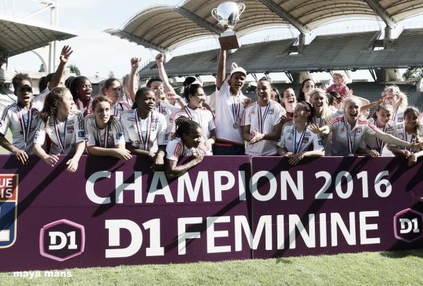 Lyon celebrate their league title. | Image source: UEFA