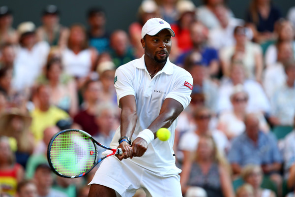 Donald Young hits a backhand during his second-round loss. Photo: Clive Brunskill/Getty Images