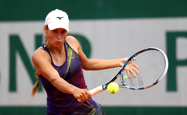 Yulia Putintseva hits a drop shot at the French Open in Paris/Getty Images: Julian Finney