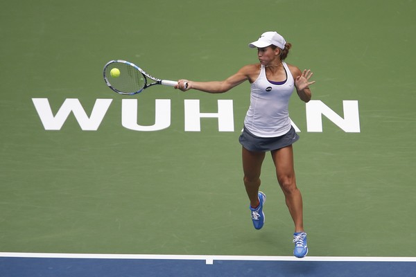 Yulia Putintseva hits a forehand at the Dongfeng Motor Wuhan Open/Getty Images: Wang He