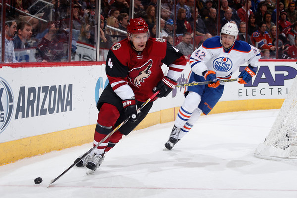 Zbynek Michalek #4 of the Arizona Coyotes skates with the puck ahead of Anton Slepyshev #42 of the Edmonton Oilers during the second period of the NHL game at Gila River Arena on November 12, 2015 in Glendale, Arizona. (Nov. 11, 2015 - Source: Christian Petersen/Getty Images North America)