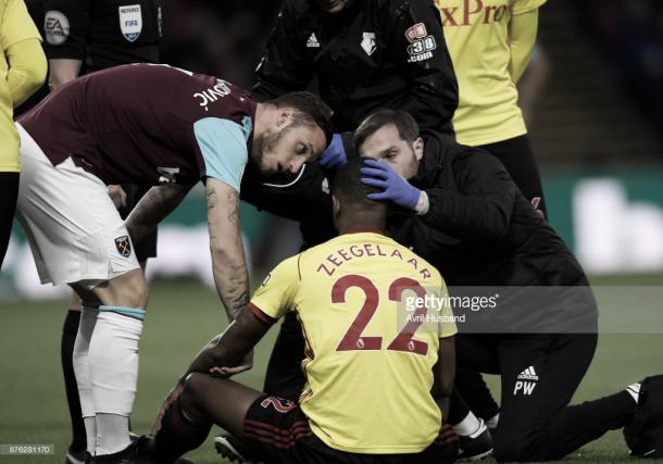  Marvin Zeegelaar receives treament after being introduced to Andy Carroll (Photo: Avril Husband / getty Images)