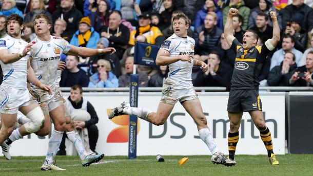 Wasps', Jimmy Gopperth, celebrates his Champions Cup overtime conversion, as Chiefs players look on in their agonising 25-24 European defeat. (image via wasps)