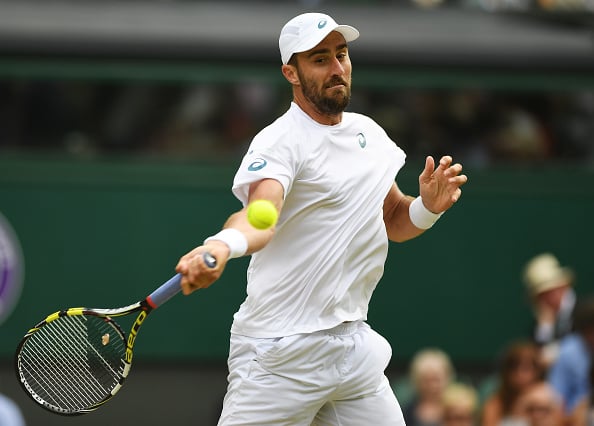 Steve Johnson strikes a forehand shot (Photo: Shaun Botterill/Getty Images)