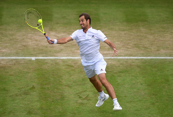 Richard Gasquet goes for a volley (Photo: Shaun Botterill/Getty Images)