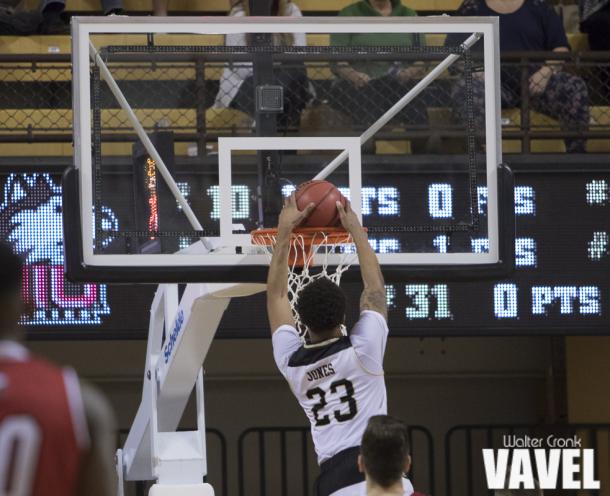 Western Michigan's Reggie Jones (23) got the play of the game with a steal and fast break dunk. Photo: Walter Cronk