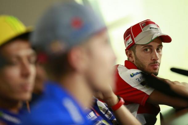 Dovizioso watches on as Vinales discusses his win - www.motogp.com