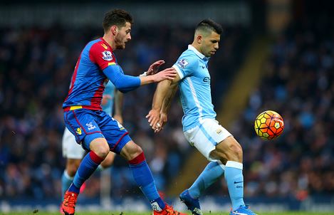 Aguero in a tussle with Joel Ward for possession, against Palace last week | Image: Getty