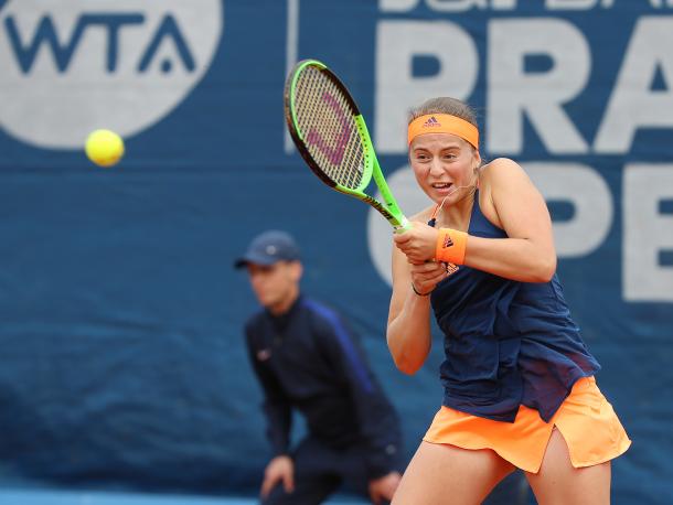 Jelena Ostapenko hits a backhand | Photo: J&T Banka Prague Open