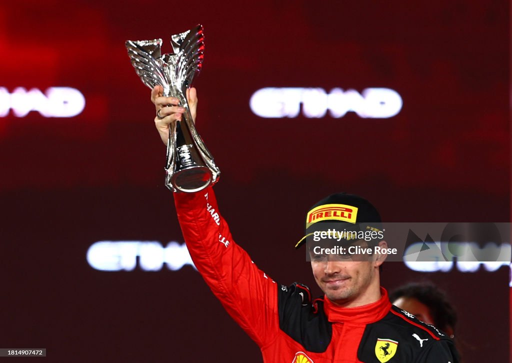 Second placed Charles Leclerc of Monaco and Ferrari celebrates on the podium during the F1 Grand Prix of Abu Dhabi at Yas Marina Circuit on November 26, 2023 in Abu Dhabi, United Arab Emirates. (Photo by Clive Rose/Getty Images)