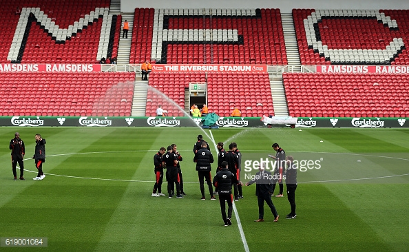 Bournemouth players inspecting the pitch ahead of kick off at the Riverside | Photo: GettyImages/Nigel Roddis