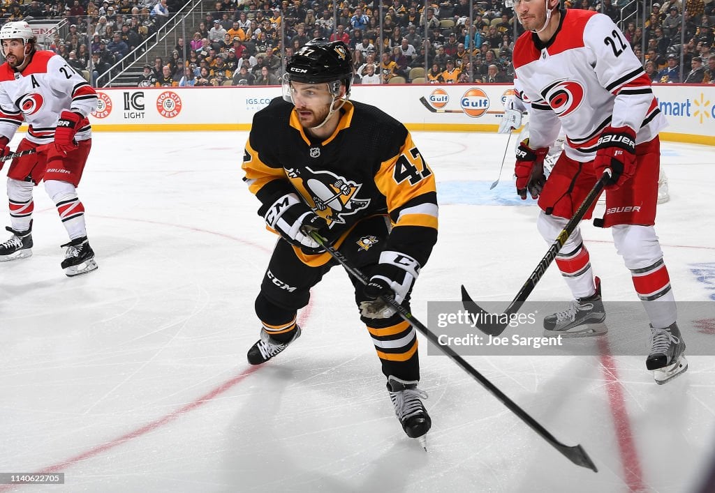 Adam Johnson #47 of the Pittsburgh Penguins skates against the Carolina Hurricanes at PPG Paints Arena on March 31, 2019 in Pittsburgh, Pennsylvania. (Photo by Joe Sargent/NHLI via Getty Images)