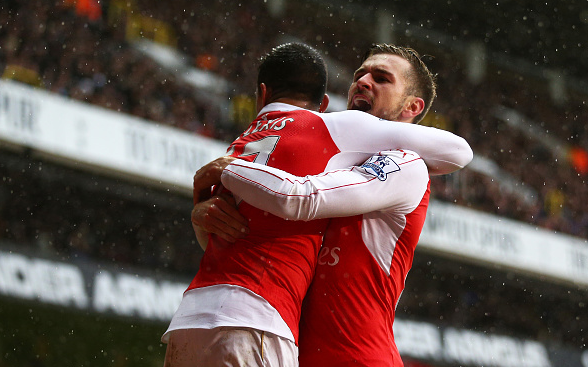 Man of the moment: Alexis celebrates his well-taken equaliser alongside fellow goalscorer Ramsey, making it 2-2 | Photo: Getty