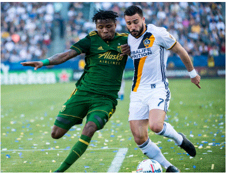 Alvas Powell (left) during the game against the Galaxy | Source: Shaun Clark - Getty Images