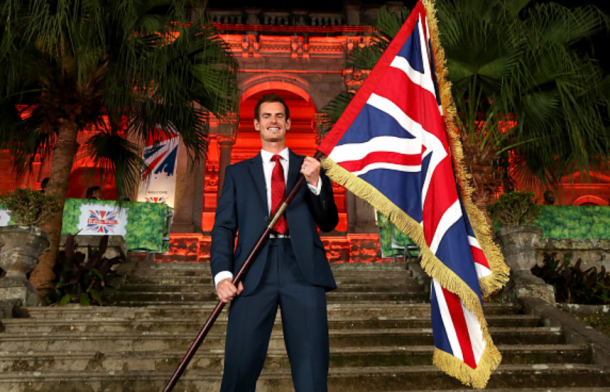 Andy with the Great British flag in hand, at the flagbearer photocall earlier this week. | Photo: Getty