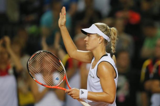 Angelique Kerber celebrates after her victory over Romania in Fed Cup/Getty Images