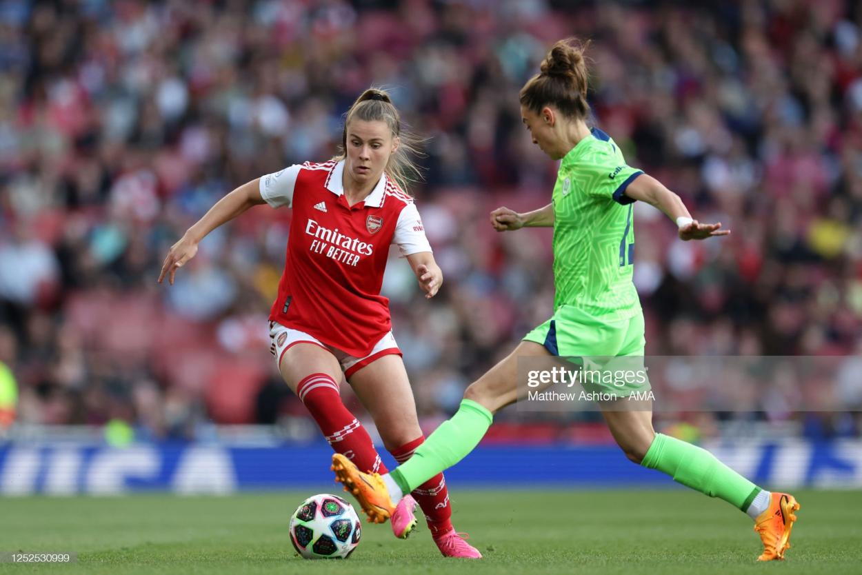 Victoria Pelova of Arsenal Women and Felicitas Rauch of Wolfsburg Women during the UEFA Women's <strong><a  data-cke-saved-href='https://www.vavel.com/en/football/2023/04/27/womens-football/1145122-carla-ward-would-love-to-keep-loanee-kirsty-hanson-long-term.html' href='https://www.vavel.com/en/football/2023/04/27/womens-football/1145122-carla-ward-would-love-to-keep-loanee-kirsty-hanson-long-term.html'>Champions League</a></strong> semifinal 2nd leg match between Arsenal and VfL Wolfsburg at Emirates Stadium on May 1, 2023. (Photo by Matthew Ashton - AMA/Getty Images)