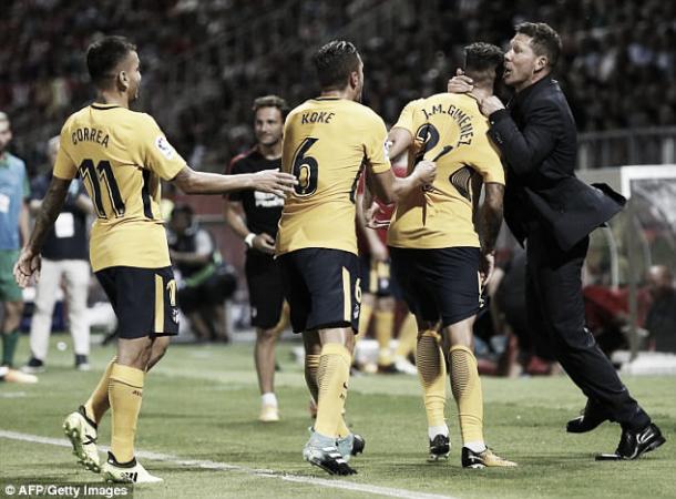 Los jugadores del Atleti celebrando un gol con el Cholo | Foto: AFP/Getty Images