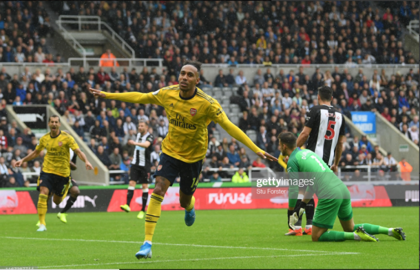 Pierre-Emerick Aubameyang wheels away after putting Arsenal ahead