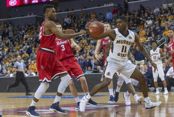 Amanze Ekegeze tries to knock the ball away from Murray State's 