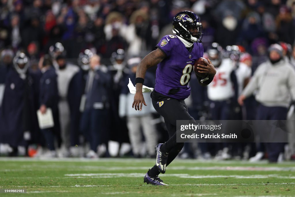 Quarterback Lamar Jackson #8 of the Baltimore Ravens rushes with the ball against the Houston Texans during the second quarter in the AFC Divisional Playoff game at M&T Bank Stadium on January 20, 2024 in Baltimore, Maryland. (Photo by Patrick Smith/Getty Images)