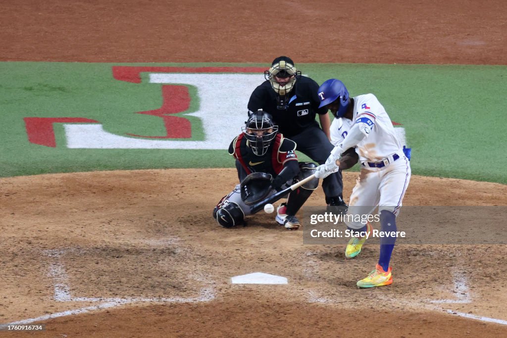 Adolis García #53 of the Texas Rangers hits a home run in the 11th inning to beat the Arizona Diamondbacks 6-5 in Game One of the World Series at Globe Life Field on October 27, 2023 in Arlington, Texas. (Photo by Stacy Revere/Getty Images)