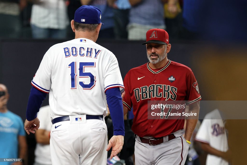 Manager Bruce Bochy of the Texas Rangers and manager Torey Lovullo of the Arizona Diamondbacks meet prior to Game One of the World Series at Globe Life Field on October 27, 2023 in Arlington, Texas. (Photo by Jamie Squire/Getty Images)